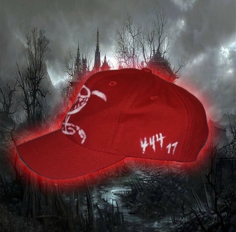 Red glowing baseball cap hovering over a dark dystopian landscape with bare trees and gothic buildings