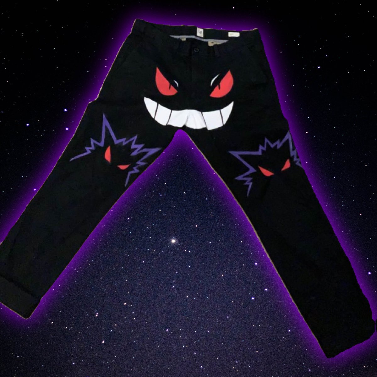 Black pants with glowing purple edges and Haunter Pokemon face design featuring red eyes and grinning mouth on leg