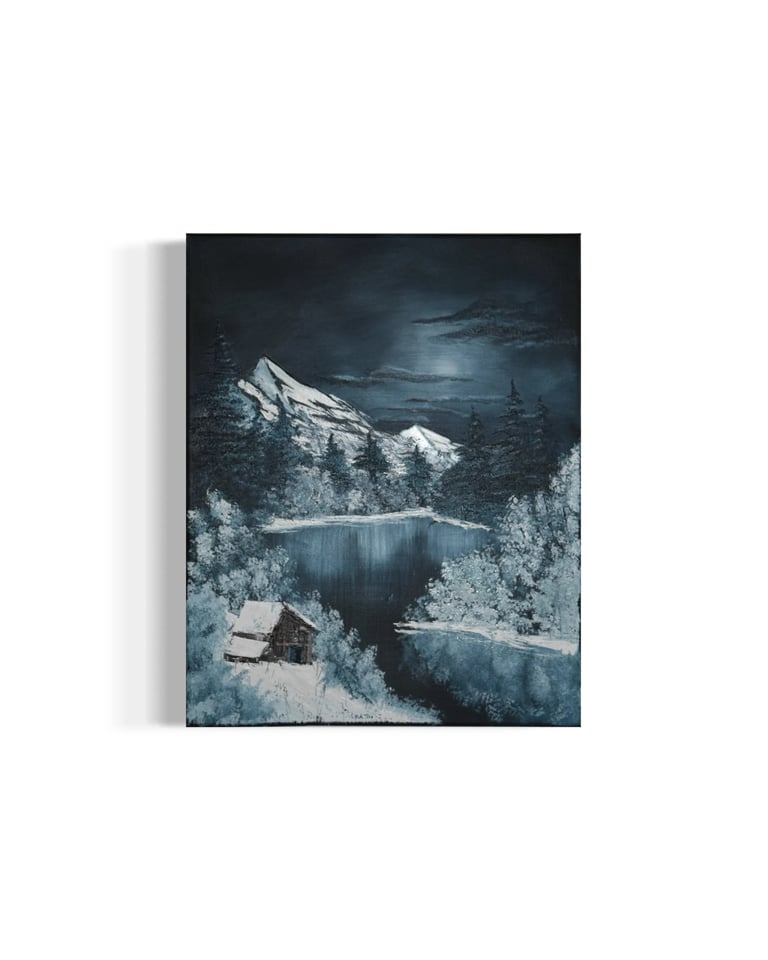 Canvas print of a snowy mountain landscape with a frozen lake, pine trees, and cabin under moonlight